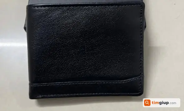 Mất bóp nam màu đen chứa giấy tờ tại QL50 đi Quận 6